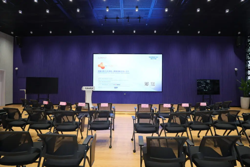 Business professionals visiting innovative companies in China