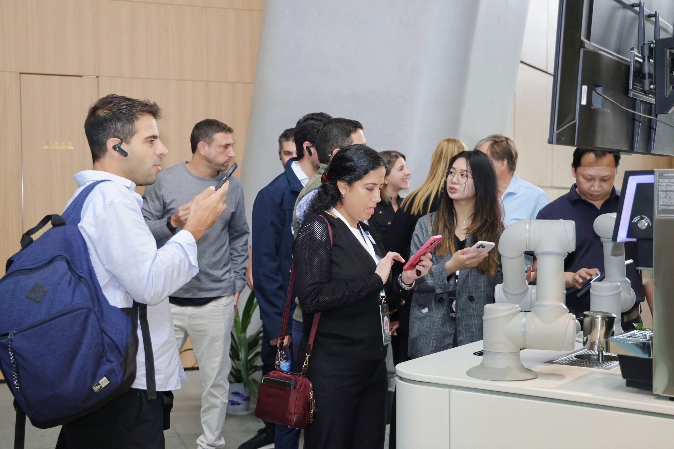 Foreign business delegation on a corporate visit to a Chinese technology company in Shenzhen