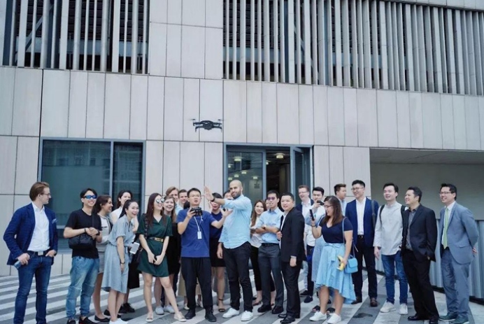 Executives touring DJI's Sky City headquarters and sky bridge in Nanshan, Shenzhen