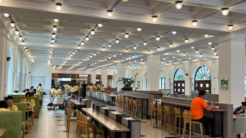 Staff canteen at Huawei Songshan Lake Campus with R and D employees during a working day, seen on a corporate campus visit