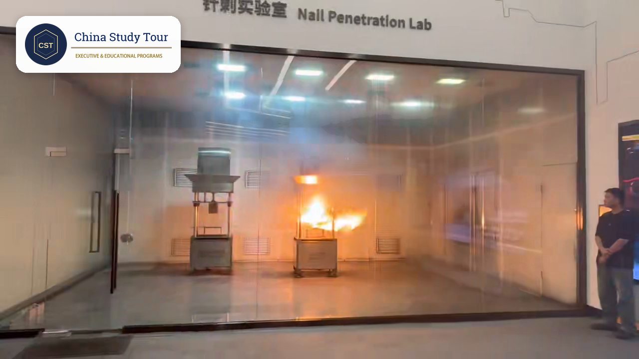 Live nail penetration test at BYD Shenzhen, where the NCM battery on the right catches fire while the Blade Battery on the left stays intact